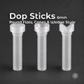 Three transparent polycarbonate lapidary dop sticks standing on a dark background, showing flat round, recessed cone and V-shaped wedge profiles. Each dop has a 6 mm shaft and is designed for epoxy or CA gemstone dopping in compatible faceting equipment.