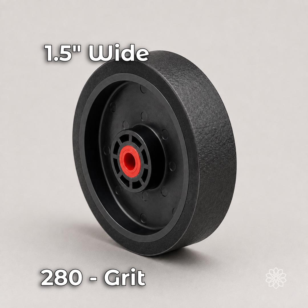 Six-inch by 1.5-inch soft-backed diamond resin cabbing wheel in 280 grit, shown with a black flexible abrasive surface and red arbor bushing. Used after hard grinding to remove deeper scratches while refining curved gemstone surfaces.