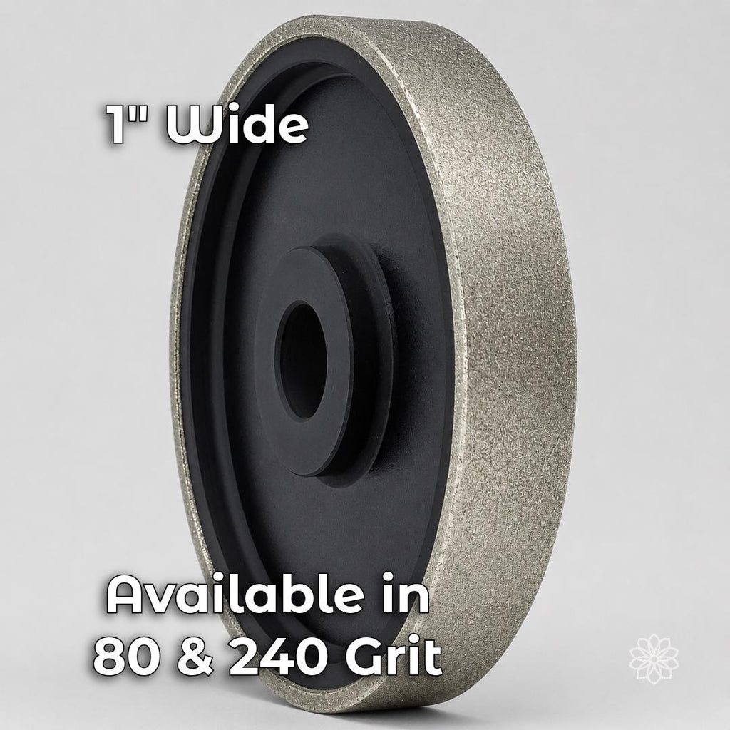 One-inch-wide hard electroplated diamond grinding wheel for 6-inch lapidary cabbing machines, shown with a rigid black hub and diamond-coated surface. Available in coarse 80 grit for aggressive shaping and 240 grit for refining saw marks and rough cabochon forms.