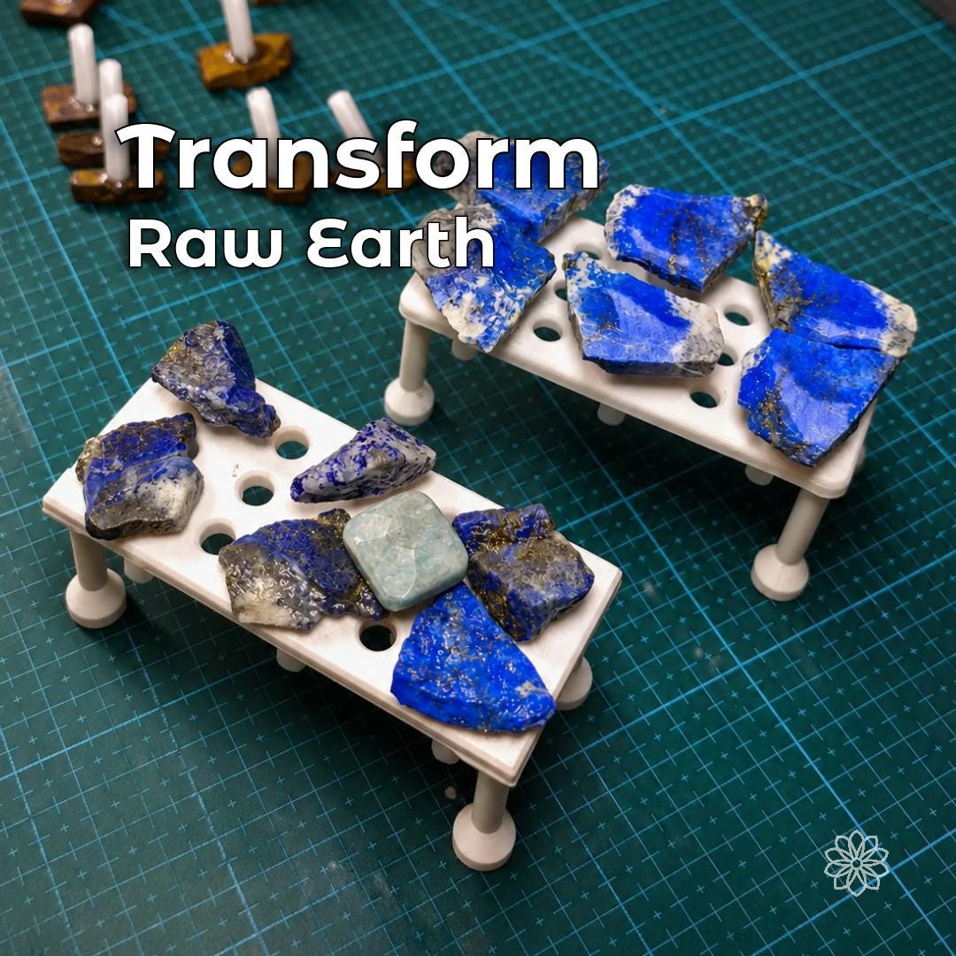 Rough blue lapis lazuli stones and partially shaped cabochon preforms arranged on lapidary dop stands. The image shows the beginning of the cabbing process before diamond grinding, sanding, pre-polishing, and final polishing.