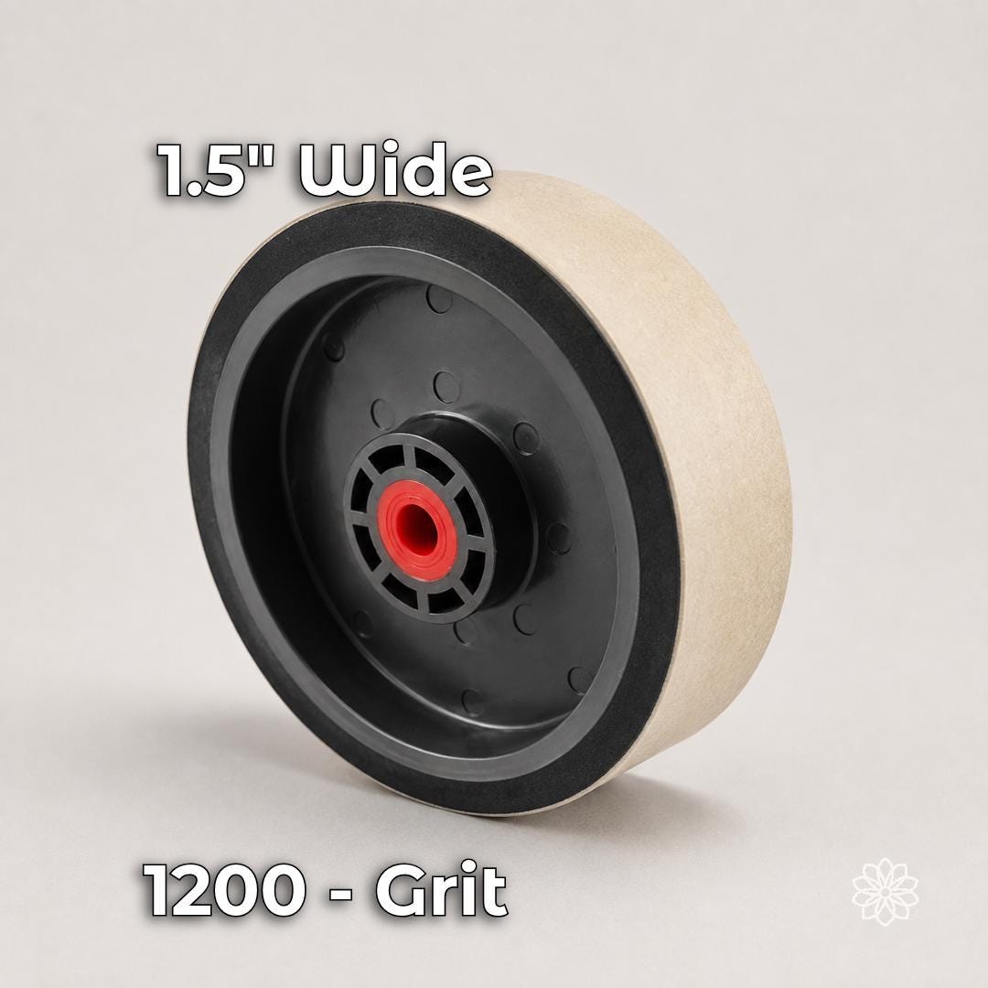 Six-inch by 1.5-inch cream-colored soft resin diamond cabbing wheel in 1200 grit. The flexible polishing wheel refines gemstone surfaces, removes finer sanding marks, and prepares cabochons for higher-grit pre-polishing.