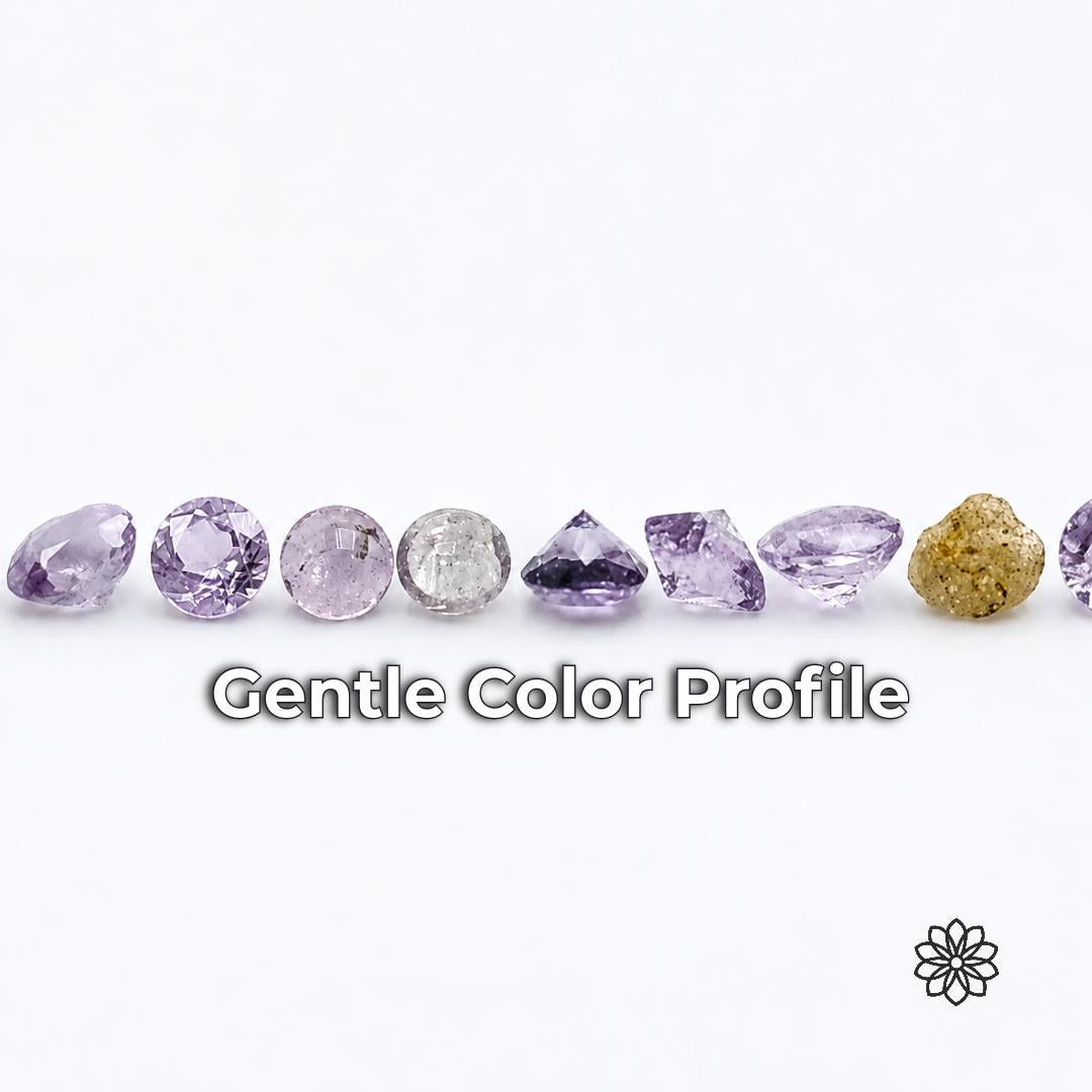 Loose lab-grown alexandrite gemstones showing a gentle pale lavender and purple color profile under bright neutral lighting. Faceted stones are displayed from multiple angles to show transparency, cut and subtle variation in color response, illustrating the softer appearance of small alexandrite stones used in fine jewelry and detail work.