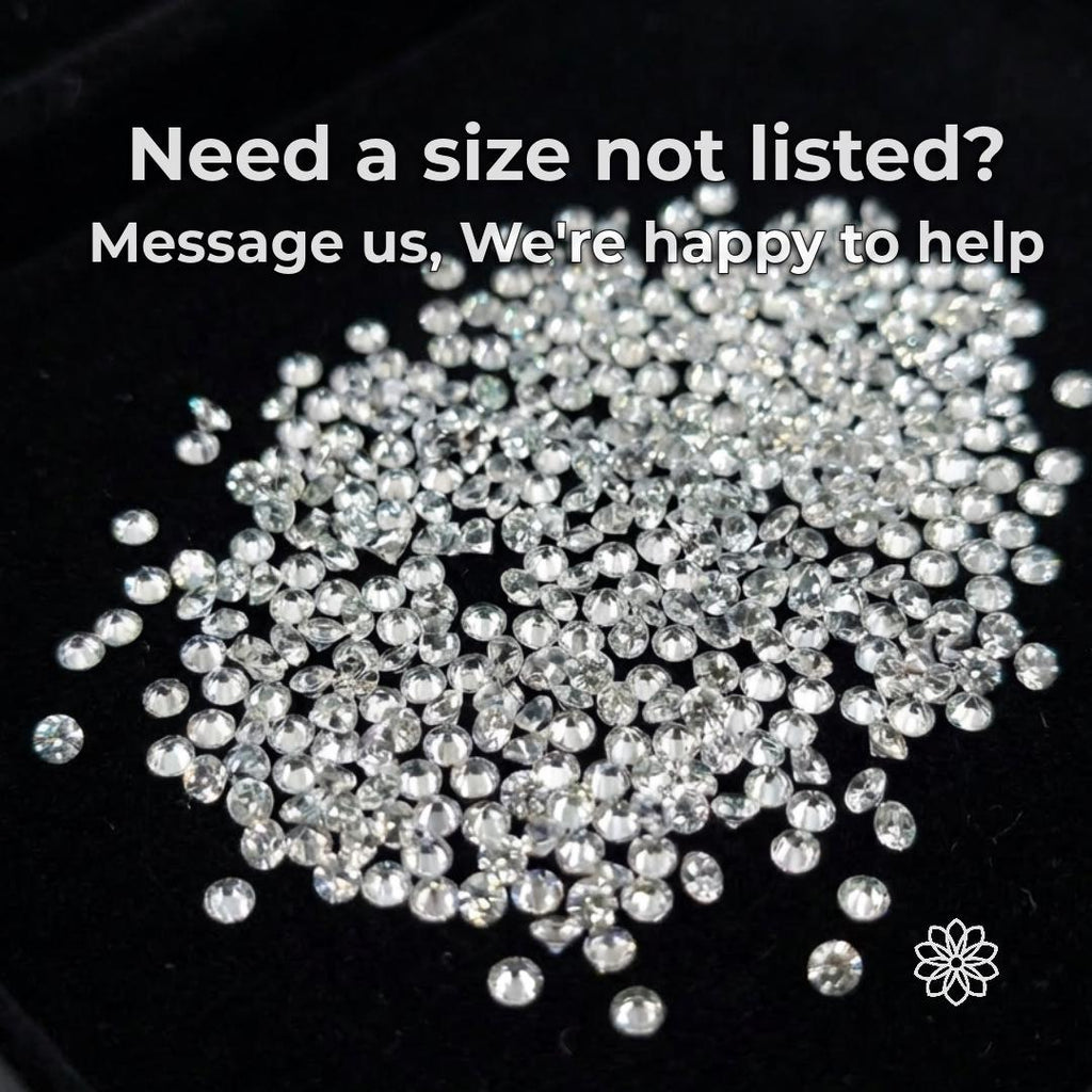 A large assortment of small loose white sapphire gemstones displayed against a black background, showing round faceted stones from multiple angles. The image represents Aetherium’s broader sourcing capability for calibrated jewelry stones, with buyers invited to request white sapphire sizes or quantities beyond the listed 1 mm and 2 mm options.