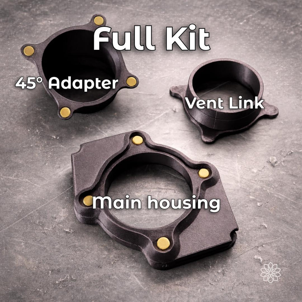 Full Tent Link kit laid out on a metal workbench with main magnetic housing, Vent Link hose coupler and 45-degree airflow adapter for connecting portable diesel heater ducting to a tent.