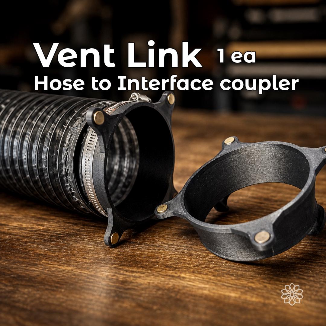 Black Vent Link hose-to-interface coupler shown attached to flexible heater duct with a metal clamp beside a matching magnetic coupler, part of the Tent Link diesel heater tent-port system.