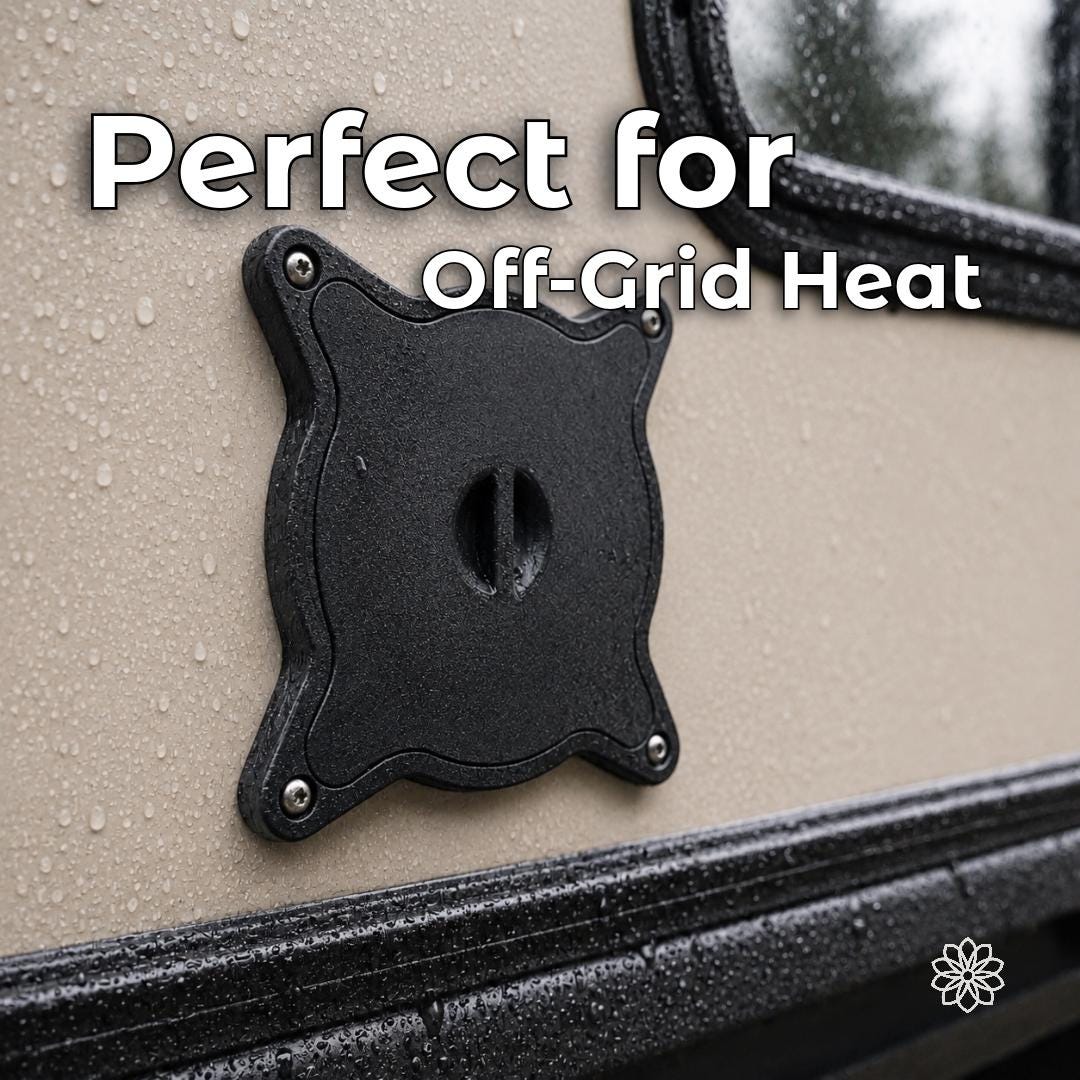 Vent Link heater pass-through closed with its removable face plate on a rain-covered camper wall, providing a clean exterior finish when the off-grid heating duct is disconnected.
