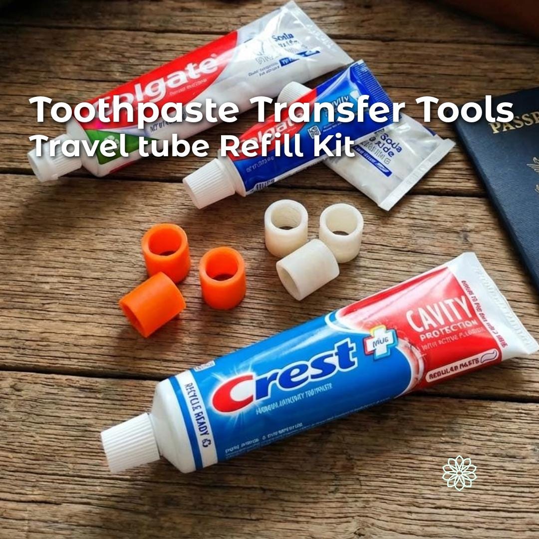 “Crest and Colgate toothpaste tubes arranged on a wooden table beside travel-size tubes, toothpaste refill adapters, and a passport. The image shows both full and miniature tubes with matching adapters to demonstrate compatibility and travel use. Scene suggests packing for flights, camping, or backpacking with lightweight hygiene tools.”