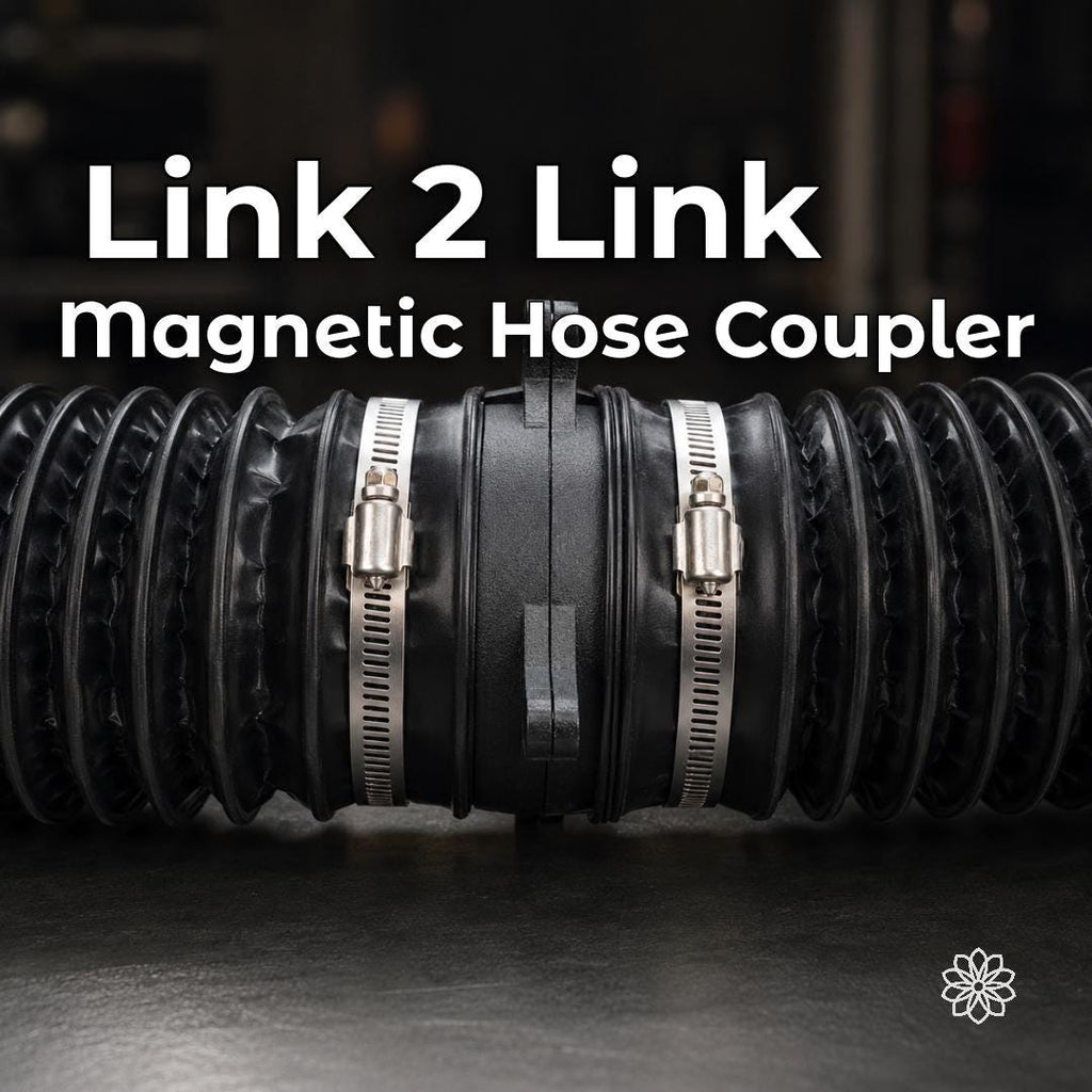 Aetherium Link 2 Link magnetic diesel heater hose coupler joining two flexible heater duct sections with hose clamps on a workshop bench.